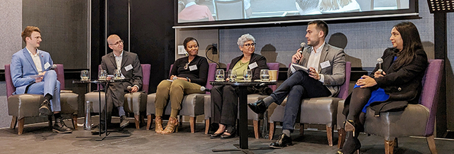 Separator Image: 6 People are sitting on a discussion panel.